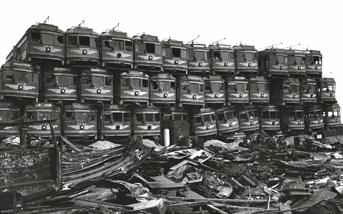 Pacific Electric cars awaiting destruction, from Wikipedia. Copyright Regents of the University of California, UCLA Library. This work is licensed under a Creative Commons Attribution-Noncommercial-Share Alike 3.0 United States License.