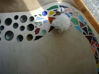 Earthship shower, inside the demo earthship, outside of Taos, New Mexico.
