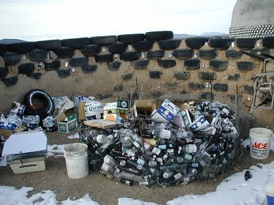 Earthship building blocks, the tires, outside of Taos, New Mexico.