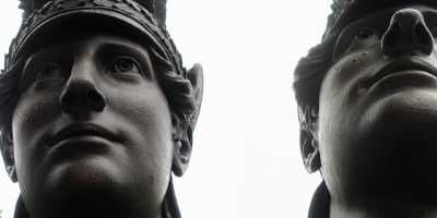 Two photographs of the face of Minerva, from the Green-Wood Cemetery in Brooklyn.