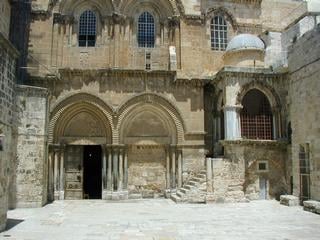 Courtyard of the Church of the Holy Sepulchre, built above Golgotha, where Jesus was crucified. If you look closely you'll see a ladder. After an earthquake well over 100 years ago, a priest went out to repair some damage. Another sect disputed his rights to do so, and claimed he was trespassing. A small war of priests broke out, priest against priest, and when it was over the ladder was left exactly where it was, to remind all future denizens to watch their tempers.