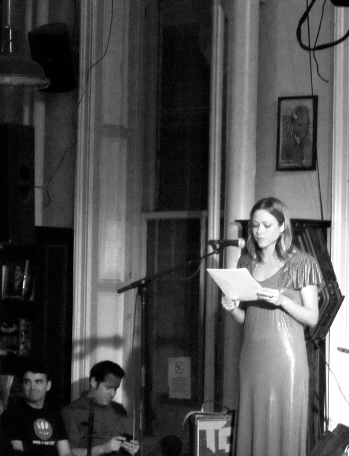 Every reading ever: someone checks their messages while you wear your shiniest dress.