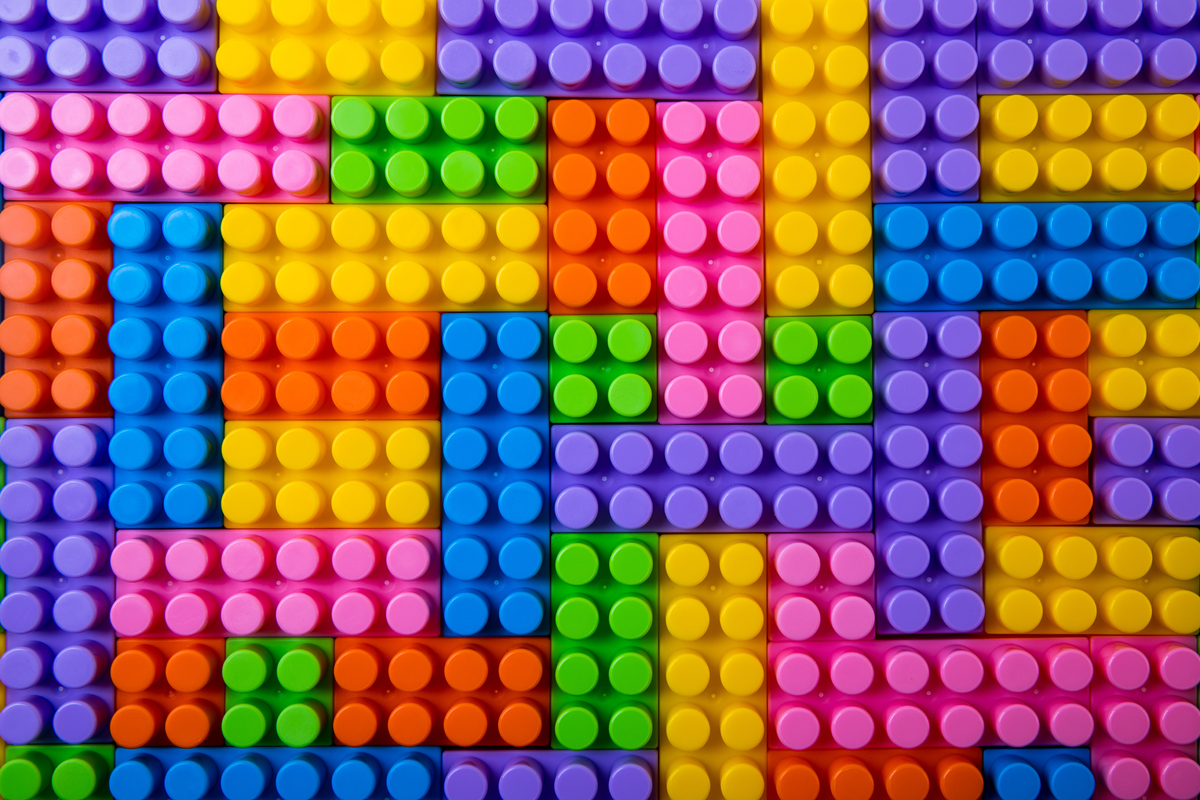 Image of multicolored legos in a grid.