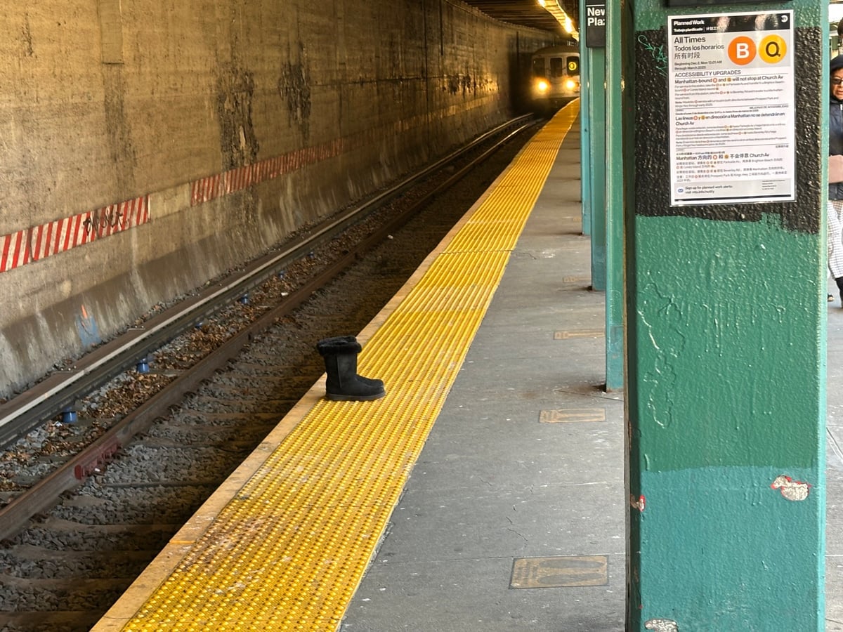 A lone pair of furry boots on the subway platform, as the train comes in. They’re right where the train will stop. It’s strange. 