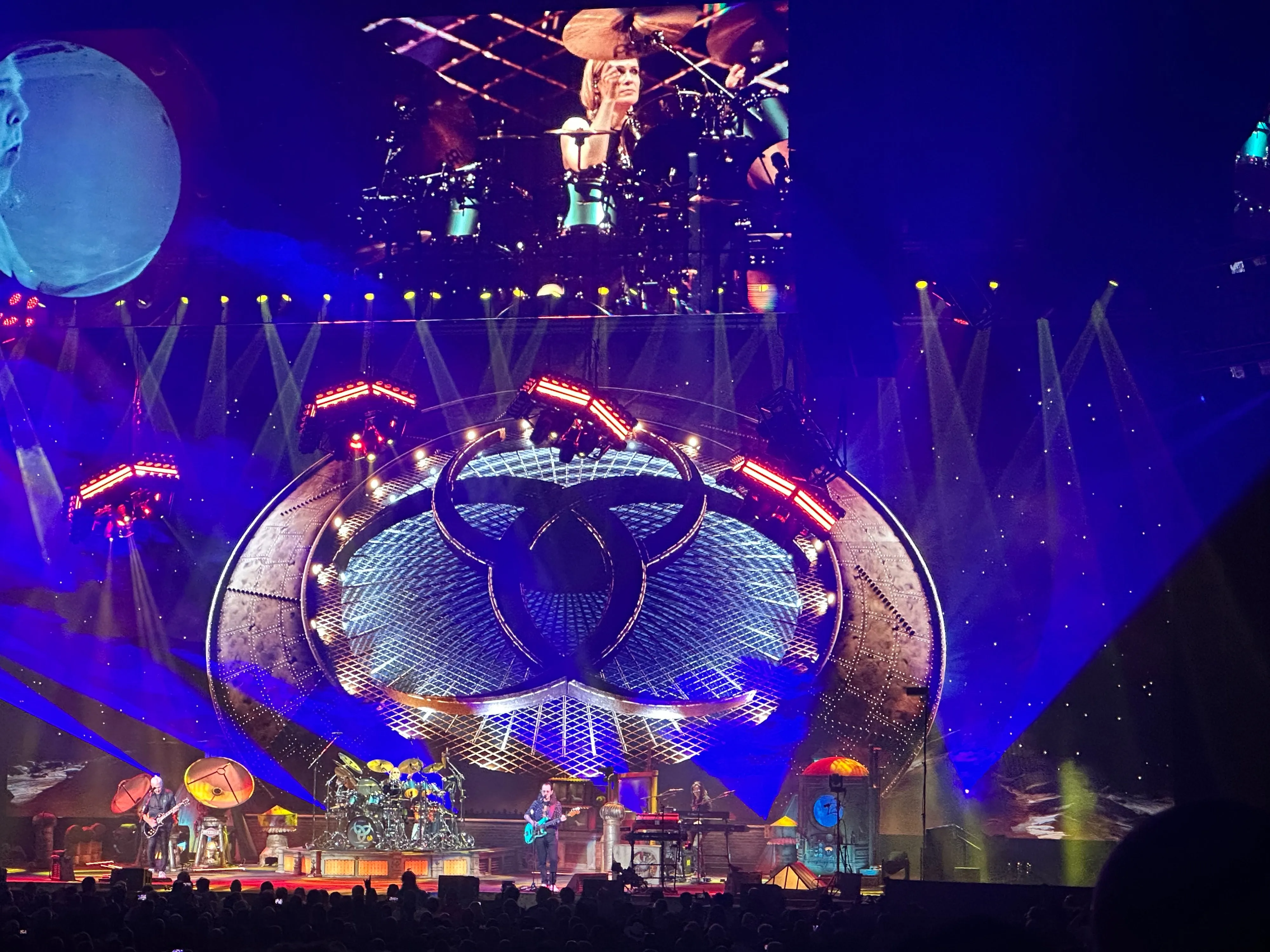 A completely ridiculous stage with Rush on it and the huge Rush logo and the drummer Anika projected on top.